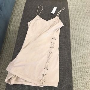Faux suede soft mini dress. Wonderfully made.